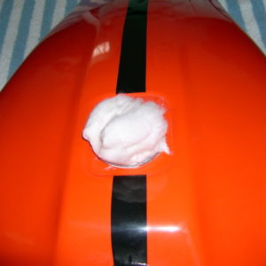 Rolled cotton in filler hole